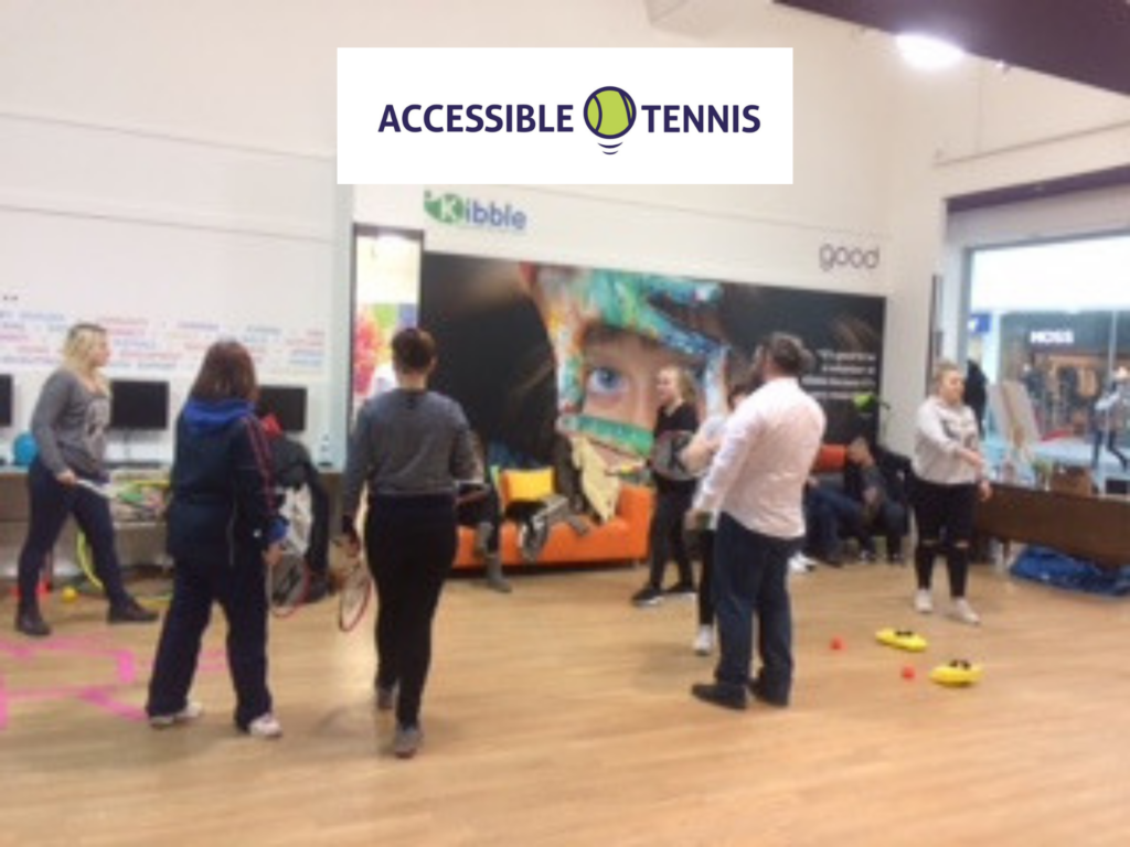 Group of tennis players inside Buchanan Galleries taking part in activities